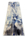 2.8' x 8' runner ivory & blue abstract watercolor modern area rug isolated on a white background.