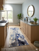 2.8' x 8' runner ivory & blue abstract watercolor modern area rug styled in a modern kitchen with light wood cabinetry and soft natural light.