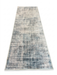 2.8' x 8' runner ivory & blue distressed linear modern area rug isolated on a white background.