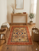 2' x 3' Rectangular Beige Rust Floral Medallion Traditional Area Rug placed in a welcoming entryway beneath a light wood console table with natural décor and woven storage basket.