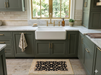 2' x 3' Rectangular Black & Ivory Floral Traditional Area Rug styled in a classic kitchen in front of a farmhouse sink.