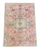 2' x 3' Rectangular Pink Ivory Distressed Medallion Vintage Traditional Area Rug isolated on a white background.
