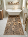 2' x 4' Rectangular Beige & Brown Floral Botanical Modern Washable Area Rug styled in a bright bathroom beneath a freestanding bathtub.