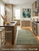 2' x 4' Rectangular Green Sage Distressed Modern Abstract Area Rug placed in a bright kitchen between island and stove.