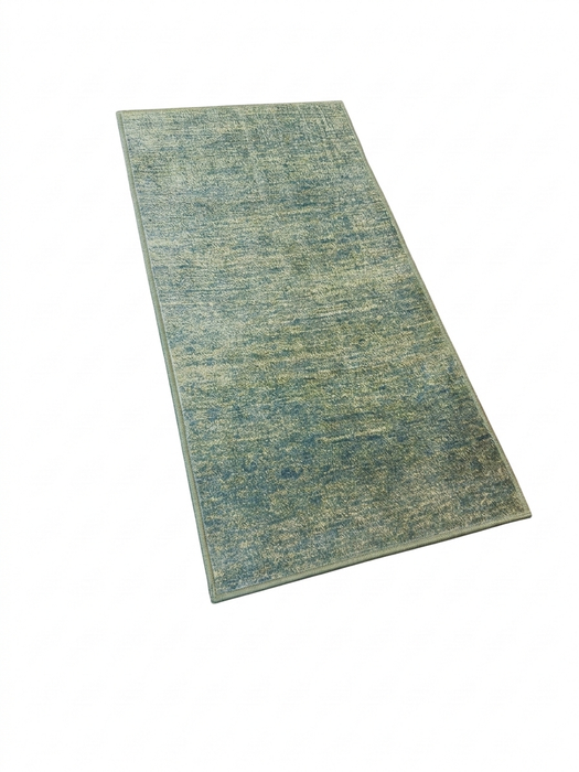 2' x 4' Rectangular Green Sage Distressed Modern Abstract Area Rug shown in an angled product design view.