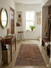 2' x 4' Runner Brown & Beige Distressed Abstract Modern Area Rug styled in a modern entryway.