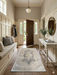 2' x 4' Runner Gray & Ivory Distressed Medallion Traditional Washable Area Rug styled in an entryway with a bench and console table.