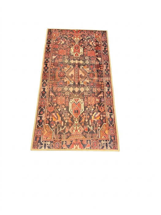 2' x 4' Runner Rust & Black Tribal Geometric Traditional Area Rug isolated on a white background.