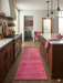 2' x 5' Runner Pink Distressed Modern Contemporary Area Rug displayed in a modern kitchen runner layout along the island.