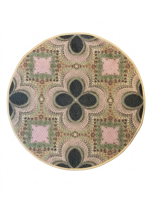 3' Round Pink Green Geometric Bohemian Washable Area Rug displayed on a white background, highlighting its circular geometric pattern with soft pink, green, beige, and charcoal tones.