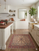 3' x 3' Square Ivory & Red Floral Medallion Traditional Area Rug styled in a kitchen with cabinetry and warm neutral finishes.