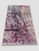 3' x 5' rectangular gray & purple abstract watercolor modern area rug isolated on a white background.