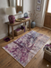 3' x 5' rectangular gray & purple abstract watercolor modern area rug placed in a stylish entryway with a wooden console table and decorative accents.