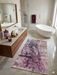 3' x 5' rectangular gray & purple abstract watercolor modern area rug styled in a luxurious bathroom with a freestanding tub and marble floors.