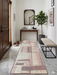 3' x 8' Runner Blush Pink Abstract Geometric Modern Washable Area Rug displayed in a bright entryway with marble flooring, a wooden console table, and contemporary décor.
