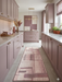 3' x 8' Runner Blush Pink Abstract Geometric Modern Washable Area Rug styled in a modern blush-toned kitchen with sleek cabinetry, gold accents, and light stone flooring.