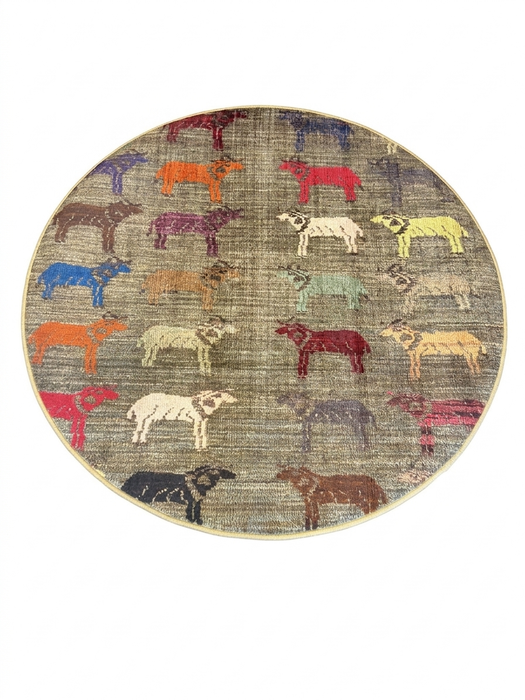 4' Round Gray Multi Color Animal Farm Rustic Novelty Area Rug styled in an entryway with light wood flooring and neutral decor.