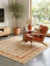 4' x 4' Square Ivory & Gold Floral Traditional Oriental Washable Area Rug styled in a contemporary living space with accent chair.