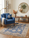 4' x 6' Rectangular Blue & Ivory Floral Traditional Area Rug styled in a cozy sitting area with classic décor.
