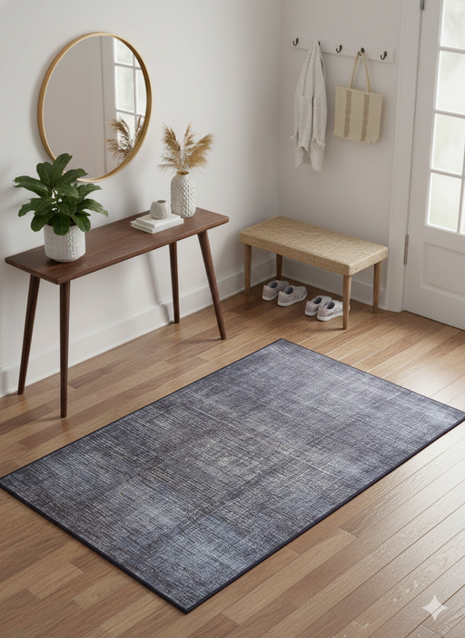 4' x 6' Rectangular Gray & Charcoal Textured Modern Washable Area Rug styled in an entryway.