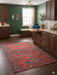 4' x 6' Rectangular Rust Red & Blue Tribal Geometric Medallion Traditional Area Rug styled in a kitchen with cabinetry and a window seat.
