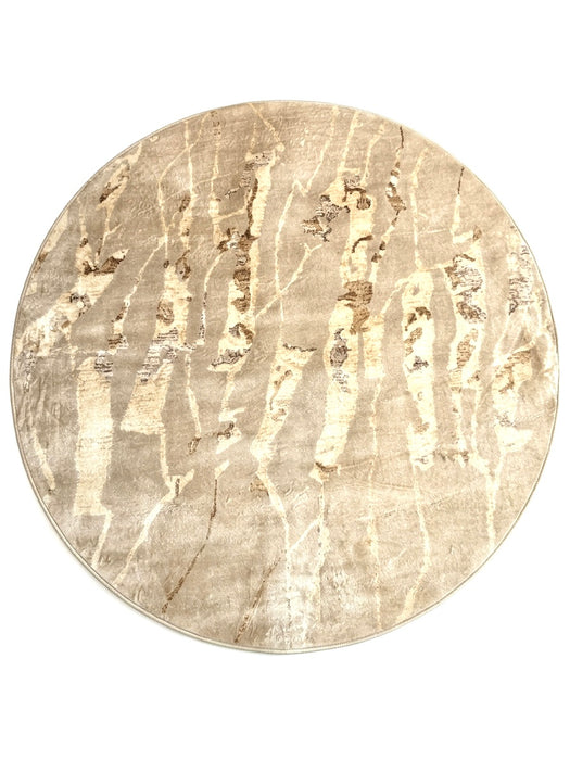 5' round beige & ivory marble abstract modern area rug isolated on a white background.