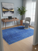 5' x 7' Rectangle Blue & Charcoal Abstract Modern Area Rug styled in a modern home office.