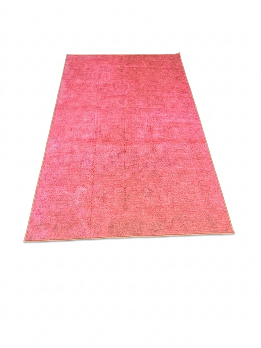 5' x 8' Rectangle Pink Distressed Modern Washable Area Rug displayed on a clean background highlighting the soft distressed texture and vibrant pink tone.