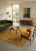 5' x 8' Rectangular Gold & Mustard Distressed Floral Traditional Washable Area Rug styled in a living room with green seating and natural light.