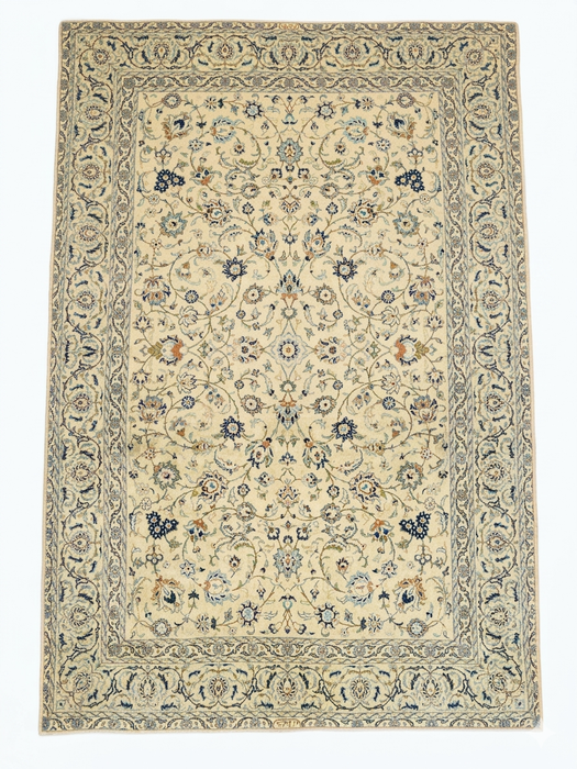 5' x 8' Rectangular Ivory Blue Floral Traditional Oriental Area Rug isolated on a white background.