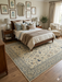 5' x 8' Rectangular Ivory Blue Floral Traditional Oriental Area Rug styled in a bedroom.