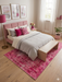 5' x 8' Rectangular Pink Distressed Oriental Vintage Area Rug placed in a soft and elegant bedroom with pastel décor.