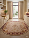6' Round Ivory Burgundy Floral Medallion Traditional Area Rug styled in a bright kitchen with cream cabinetry and traditional accents.