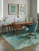 6' x 6' Square Blue Green Distressed Floral Vintage Transitional Area Rug styled in a home office with a wooden desk and coordinating decor.