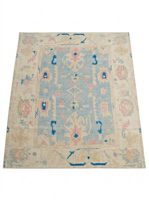 6' x 6' Square Ivory & Blue Tribal Medallion Traditional Area Rug product view highlighting the tribal medallion pattern and soft pastel tones.