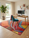 6' x 6' Square Multicolor Modern Abstract Geometric Area Rug styled in a home office with a wooden desk and vibrant decor.
