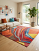 6' x 6' Square Multicolor Modern Abstract Geometric Area Rug styled in a living room with neutral seating and colorful accents.