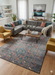 6' x 9' Rectangle Teal Blue Rust Geometric Traditional Area Rug  styled in a contemporary living room.