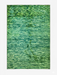 6' x 9' Rectangular Green Distressed Abstract Modern Area Rug isolated on a white background.