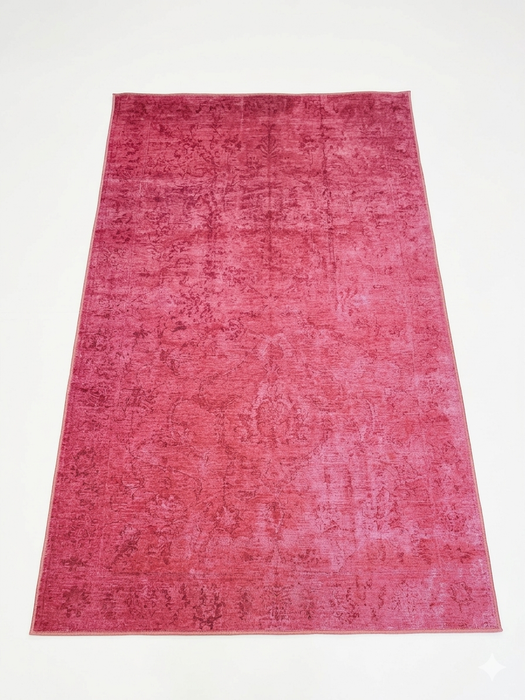 6' x 9' Rectangular Pink & Rose Distressed Vintage Washable Area Rug isolated on a white background.