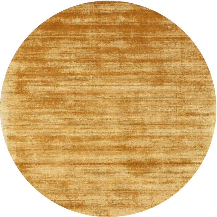 7' Round Gold & Beige Distressed Abstract Modern Area Rug displayed on a plain background.