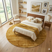 7' Round Gold & Beige Distressed Abstract Modern Area Rug styled in a modern bedroom under a wooden bed.