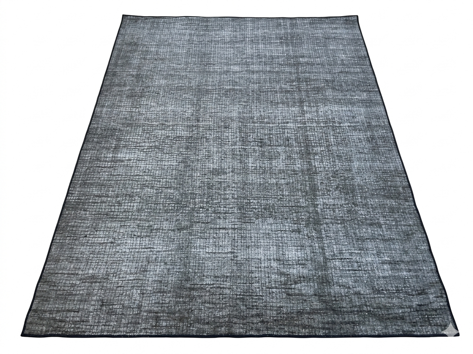 7' x 10' Rectangular Gray Charcoal Distressed Abstract Modern Washable Area Rug displayed on a white background, highlighting its textured distressed abstract design in gray and charcoal tones.
