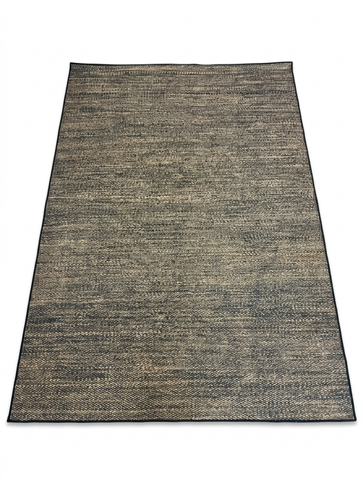 7' x 10' rectangular beige & charcoal textured minimalist modern area rug isolated on a white background.
