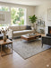 7' x 7' Square Ivory & Gray Distressed Abstract Modern Area Rug styled in a bright contemporary living room.