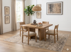7' x 7' Square Ivory Gray Distressed Medallion Vintage Area Rug shown beneath a square wooden dining table with upholstered chairs in a light and airy dining room.