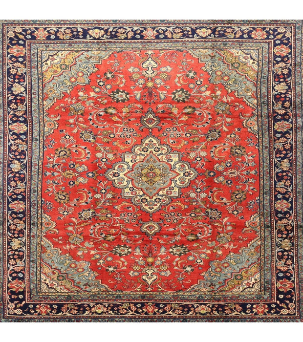 7' x 7' Square Red Navy & Ivory Medallion Traditional Area Rug isolated on a white background.