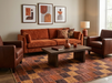 7' x 9' Rectangular Rust Gold Checkered Geometric Modern Washable Area Rug styled in a contemporary living room with a rust-colored sofa, leather chairs, and warm neutral décor.