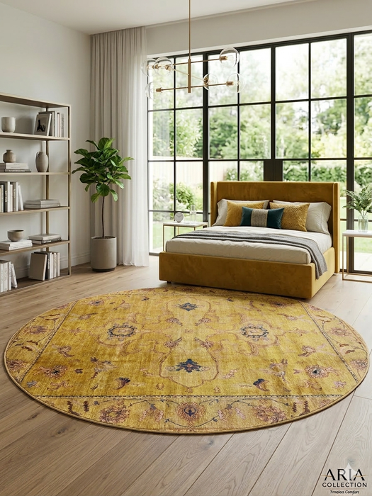 8' Round Gold Distressed Floral Medallion Vintage Traditional Area Rug styled in a bedroom.