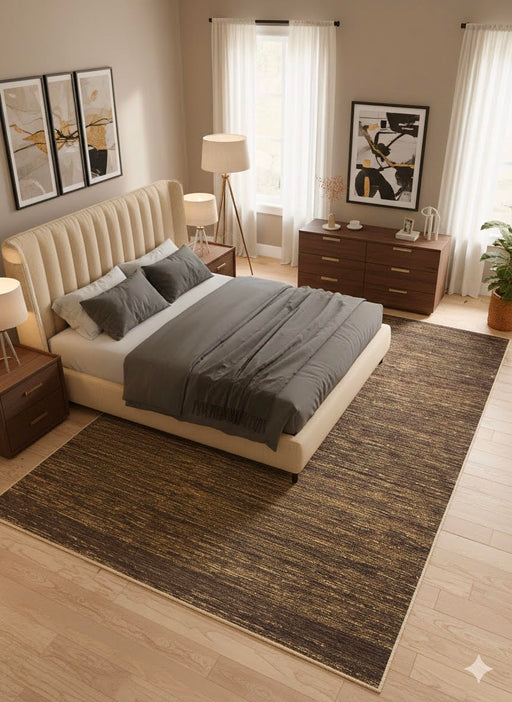 8' x 12' Deep Brown Gold Textured Modern Washable Area Rug placed in a cozy bedroom setting.